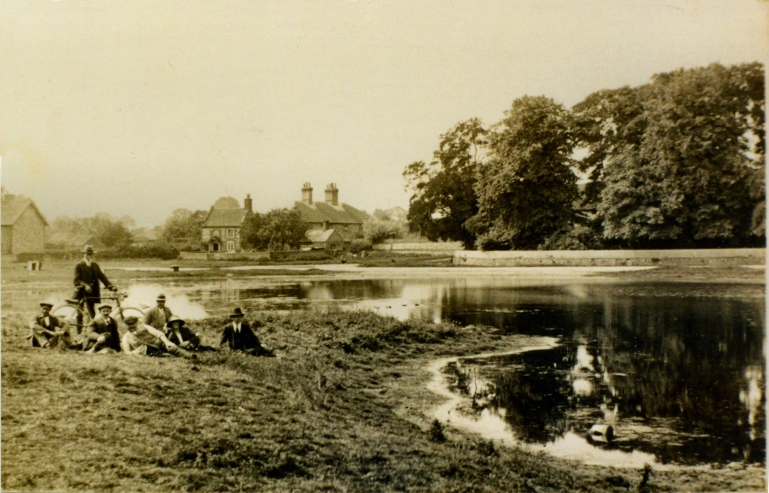 Photograph. Men by Scotsman Pit (Great Massingham Archive).